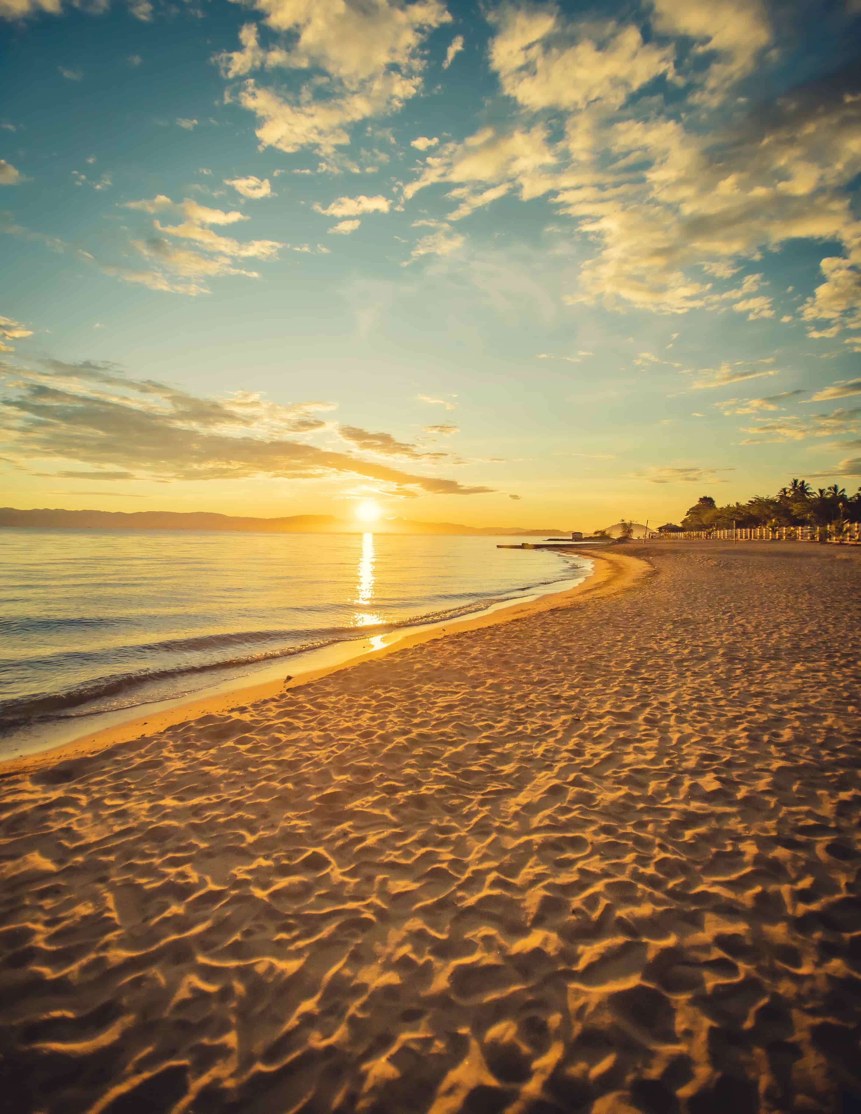 View of sun setting on the beach