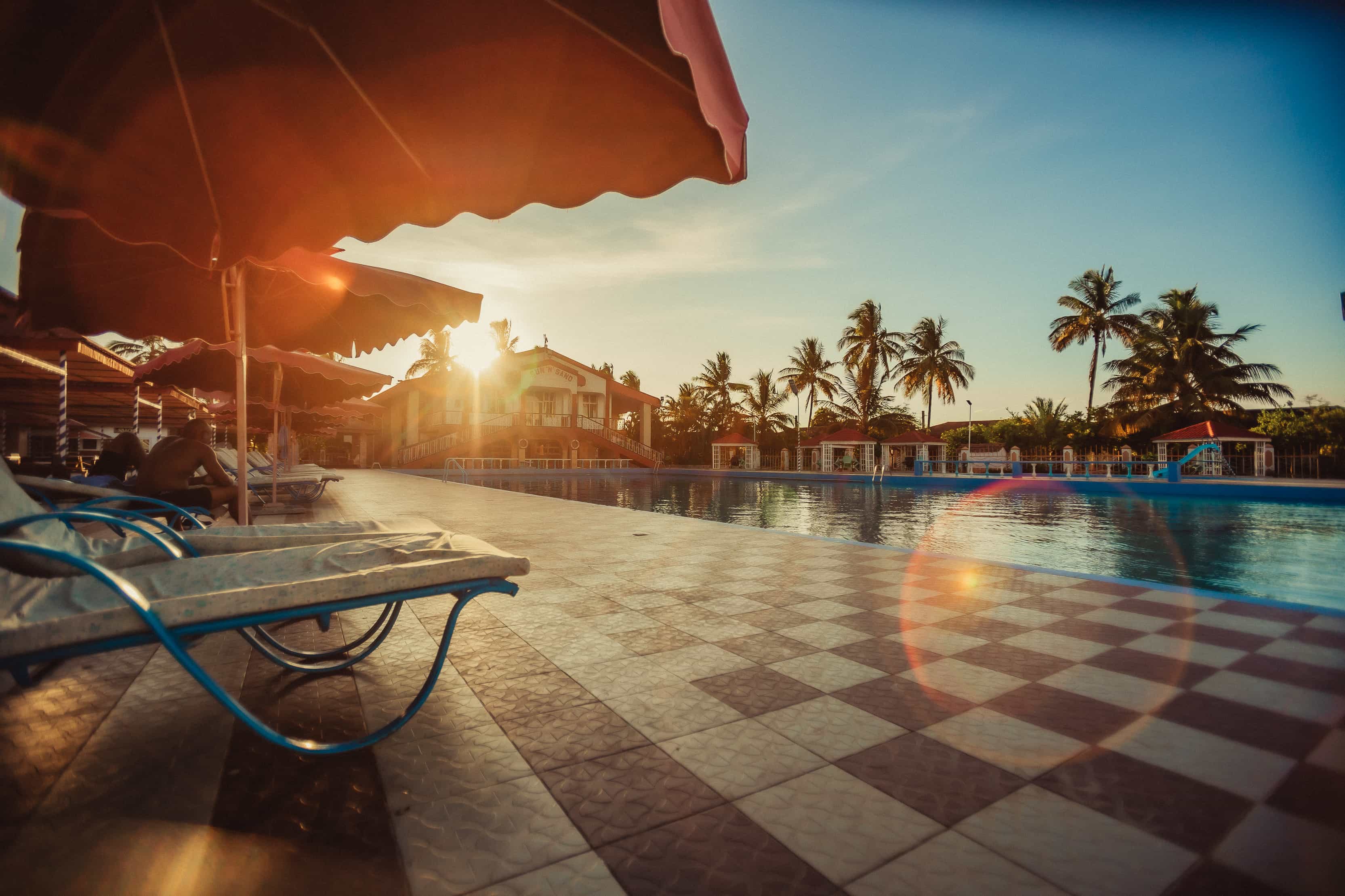 swimming pool with backdrop of sunnsand building