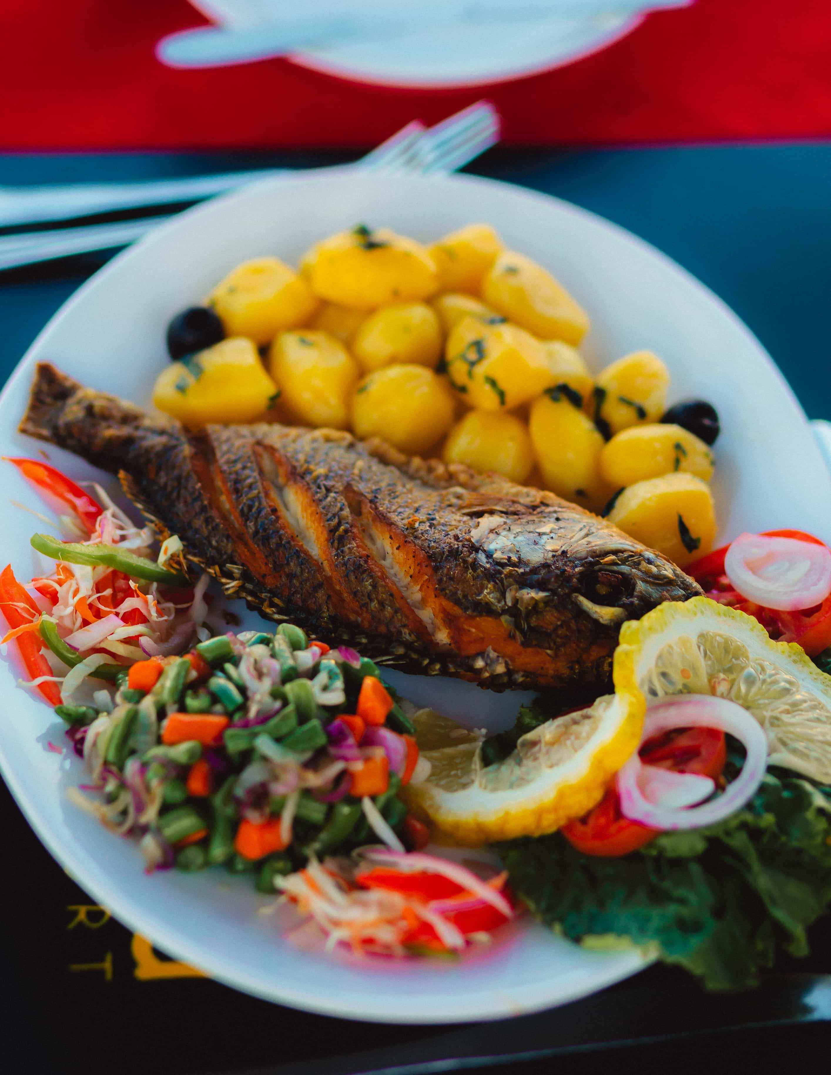plate of fish with veggies