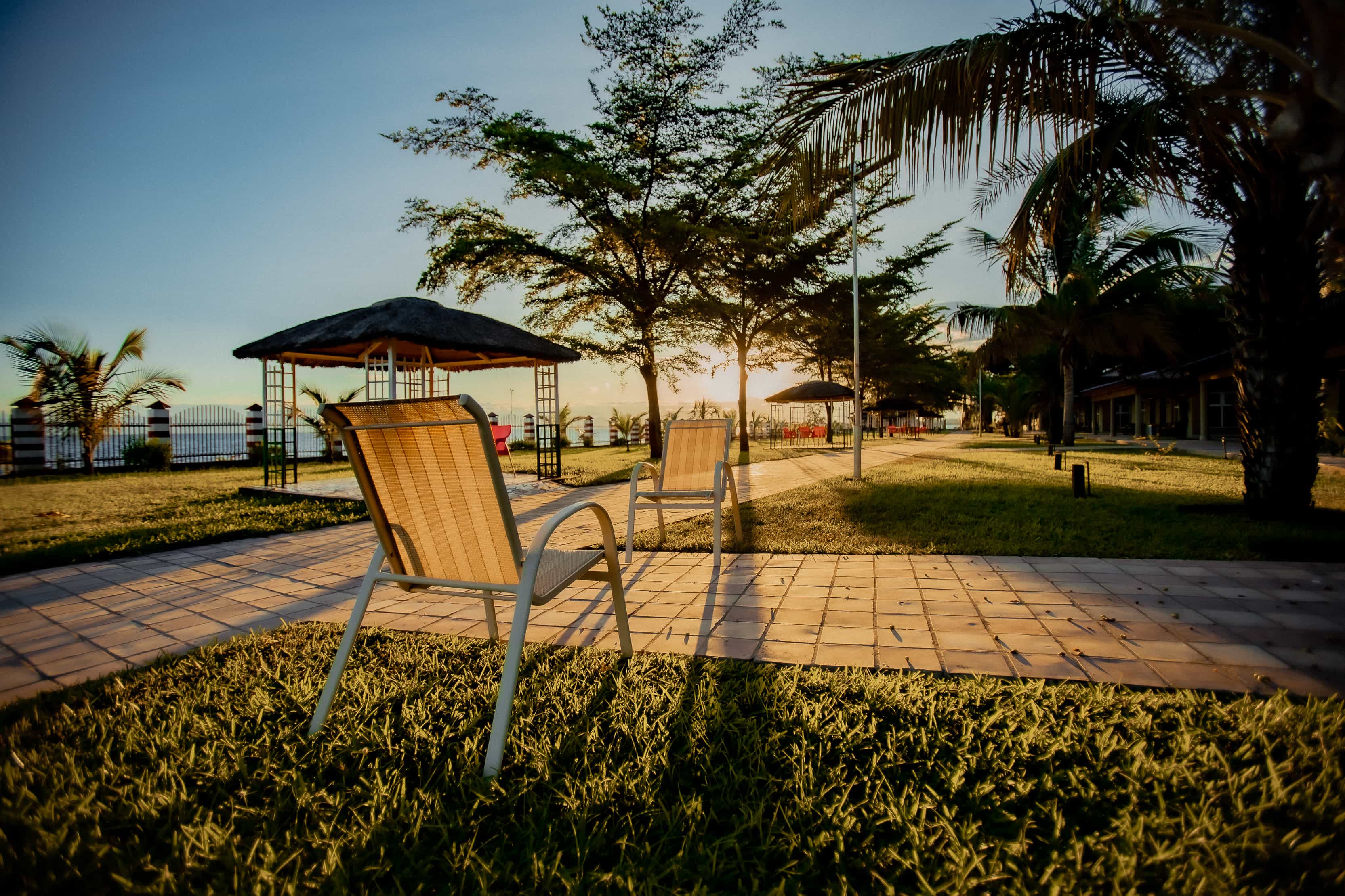 Chairs in garden with lake view